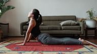 Half cobra pose for stretching (Image via Pexels/Ketut Subiyanto)